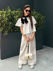 SHEIN Nova Glow Tween Girls Casual Commuter Black & White Contrast Bow Decor Short Sleeve Top And Leggings 2 Pieces Set