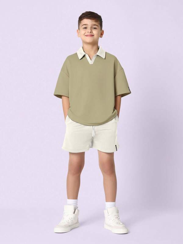 SUMWON Conjunto informal de verano de 2 piezas para niños preadolescentes con polo premium y pantalones cortos elásticos, ropa de estar en casa ligera perfecta para primavera y verano, con ajuste relajado