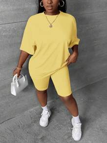 Slaydiva 音乐节节日风格大码女式夏季休闲纯色短袖上衣和短裤套装 - 黃色 - 查看 5