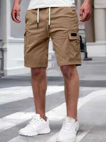 Manfinity Homme Men's Solid Color Flap Pockets Drawstring Waist Cargo Shorts