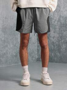 SUMWON Pantalones cortos de entrenamiento atlético de rendimiento, pantalones cortos de trabajo con bolsillos laterales, de secado rápido y que absorben la humedad, de ajuste regular, para hacer ejercicio, correr, gimnasio y usar en verano