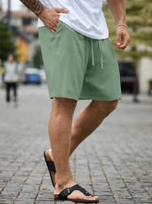 Manfinity RSRT Men's Plus Size Solid Color Drawstring Shorts With Pockets Summer Casual Linen Knee Plain Men Summer Shorts