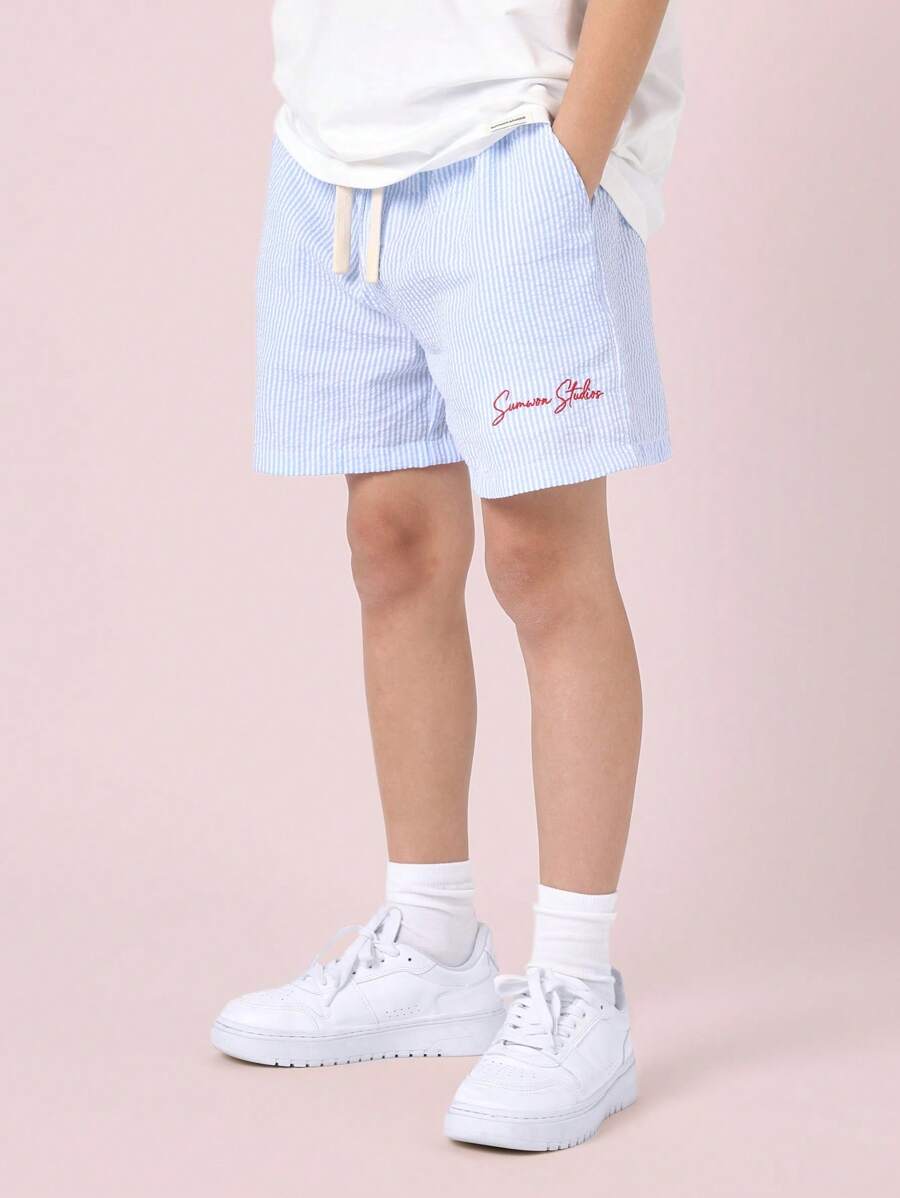 SUMWON Shorts di cotone con coulisse in seersucker, da collezione estiva per ragazzi, shorts da spiaggia in stile preppy classico con tasche laterali, perfetti per vacanze e uso casual - celeste - Visualizzare 1