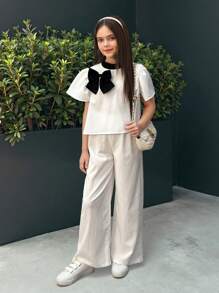 SHEIN Nova Glow Tween Girls Casual Commuter Black & White Contrast Bow Decor Short Sleeve Top And Leggings 2 Pieces Set