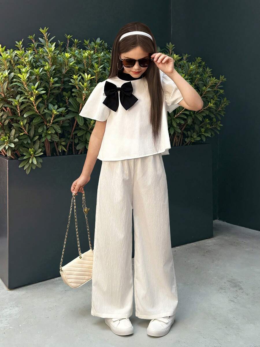 SHEIN Nova Glow Tween Girls Casual Commuter Black & White Contrast Bow Decor Short Sleeve Top And Leggings 2 Pieces Set