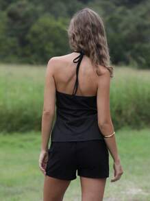 Roylia Stylized Spaghetti Strap Tie-Up Crop Top, Personalized Circle Trim Details, Curved Hem, Suitable For Concert, Party Wear - Black - View 2