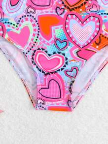 Traje de baño de una pieza con estampado de corazones y lazo para niña joven (diseño de estampado aleatorio)