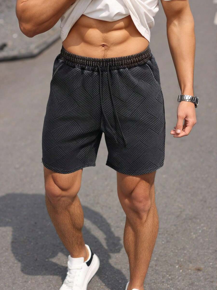 Manfinity Homme Quần short thường ngày rộng rãi có dây rút màu trơn cho nam cỡ lớn - màu đen - Xem 1