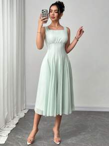 Rafferiza Vestido elegante de mujer con cintura ceñida, corte evasé, cuello de U y sin mangas, diseño de alta gama francés