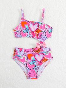 Traje de baño de una pieza con estampado de corazones y lazo para niña joven (diseño de estampado aleatorio)