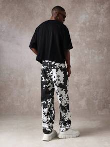 SUMWON High-Fashion Straight Leg Monochrome Cow Print Statement Pants, Animal Pattern Trousers With Side Pockets, Urban Streetwear Bottoms For Fall Winter - Black and White - View 5