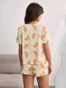 SHEIN Bộ 2 quần short tay ngắn in họa tiết bánh sừng bò hoạt hình dễ thương cho bé gái - Màu be - Xem 2