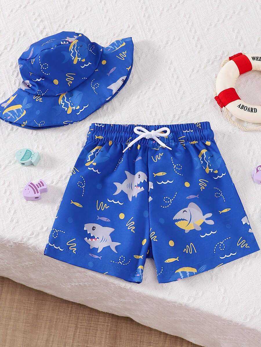 1 Set Baby Boy Beach Shorts With Sunhat, New Arrival Spring/Summer, Random Print Pattern; Baby Boy Swimsuit, New Fashion Beach Shorts. Cute Ocean Animal Cartoon Pattern, Loose Silhouette, Comfortable Wear. Blue Color With Elastic Waistband, Suitable For Toddler Boys Playing On Beach Or Pool, Also Suitable For Vacation And Daily Wear. Fits Babies Aged 6 Months To 3 Years Old For Their First Beach Holiday Baby Boy Beach Clothes Baby Boy Beach Wear - Multicolor - View 1