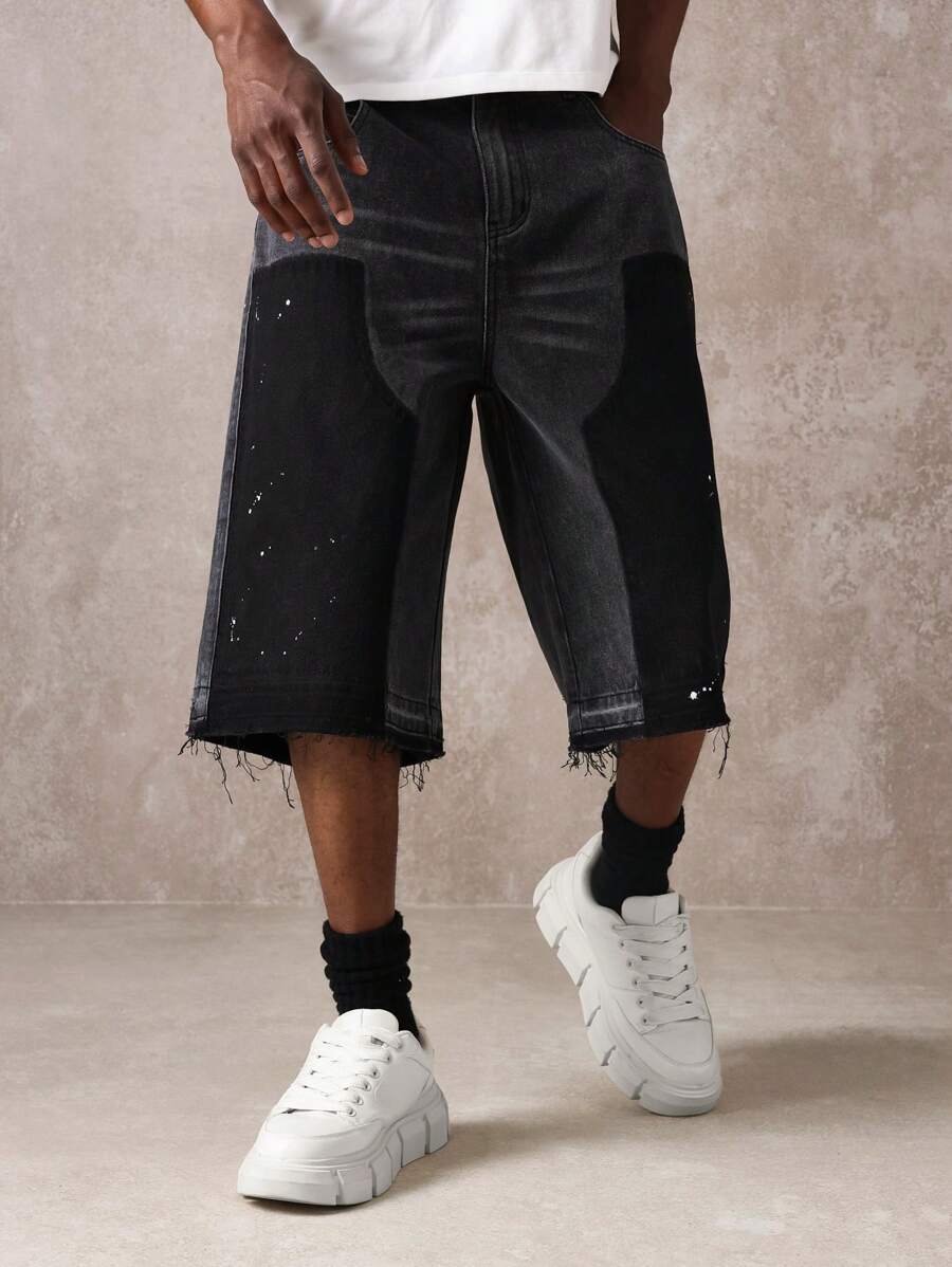 SUMWON Premium Contrast Panel Denim Shorts With Paint Splatter, Distressed Raw Hem, Contemporary Urban Streetwear Design For Summer Festival, Edgy Fashion Statement Piece