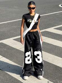 Muchica Quần ống rộng màu đen dệt kim, cạp chun, in họa tiết số dành cho nữ. - Đen và trắng - Xem 2