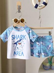 Toddler Boys' 1-3 Years Old Fashion Swimwear Set. Shark Print Sports Outfit. White Top With Light Blue Sleeves And Blue Shark Printed Shorts Set, Bright Colors, Suitable For Baby Boy's First Beach Trip And Swimming, Stretchy Fabric For Easy Movement, Perfect For Toddlers, Fashionable And Adorable Beach Look Boy Clothes For Kids Baby Boys Sets Baby Boy Beach Wear Toddler Beach Wear Boy Clothes For Baby Baby Boys Clothing Summer