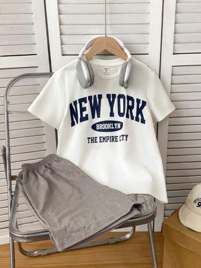 SHEIN Tween Boys Plaid Patch Pocket Round Neck Short Sleeve Shorts Loose Casual Summer Pajama Set 2pcs