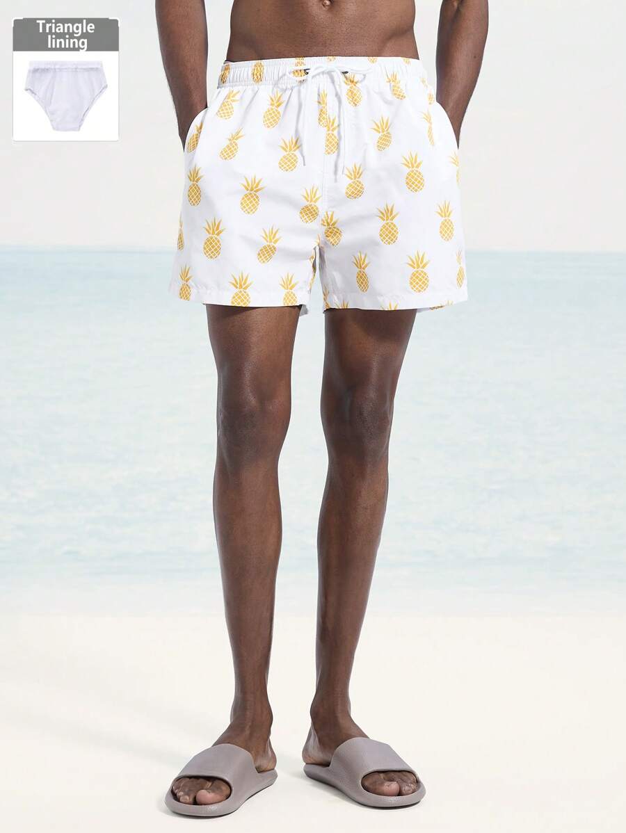 Manfinity Swimmode Pantaloni scurți de plajă pentru bărbați, cu imprimeu cu ananas, cu șnur cu talie (cu croiala asimetrică)