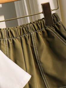 3 件套年轻男孩休闲运动度假装：卡其色字母印花 V 领背心、白色圆领短袖 T 恤、黑色撞色条纹抽绳腰部工装短裤