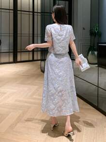 DAZY Ensemble 2 pièces pour femmes: blouse à col rond à motif floral et manches bouffantes, plus une jupe mini évasée