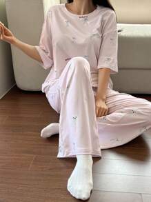 DAZY Conjunto de pijama de 2 piezas para mujer con camiseta holgada estampada con diseño lindo de perro y pantalón recto