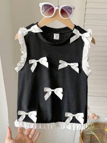 SHEIN Top sin mangas con volante y lazo decorativo de punto acanalado para niñas preadolescentes, de vuelta al colegio - Negro - Ver 1