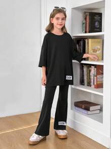 SHEIN Tween Girl Casual Woven Label Decor Loose Fit Crew Neck Short Sleeve T-Shirt And Bell Bottom Pants 2 Pieces Set - Black - View 6