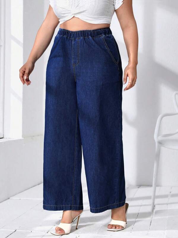 SHEIN Essnce Pantalones vaqueros de talla grande para mujer con cintura elástica y bolsillos, pierna ancha