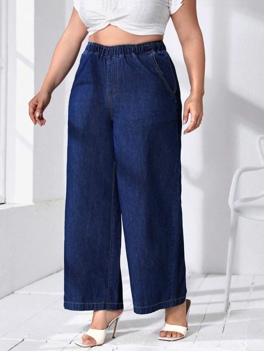 SHEIN Essnce Jeans a vita elastica con tasche, a gamba ampia, taglie comode per donne