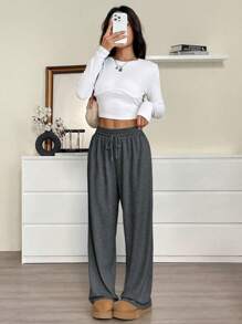 SHEIN EZwear Pantalones de chándal sueltos de unicolor con cordón en la cintura para mujer