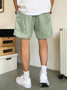 Manfinity Homme Loose Fit Men's Slant Pockets Drawstring Waist Shorts