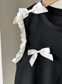 SHEIN Top sin mangas con volante y lazo decorativo de punto acanalado para niñas preadolescentes, de vuelta al colegio - Negro - Ver 6
