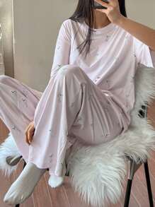 DAZY Conjunto de pijama de 2 piezas para mujer con camiseta holgada estampada con diseño lindo de perro y pantalón recto