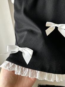 SHEIN Top sin mangas con volante y lazo decorativo de punto acanalado para niñas preadolescentes, de vuelta al colegio - Negro - Ver 7