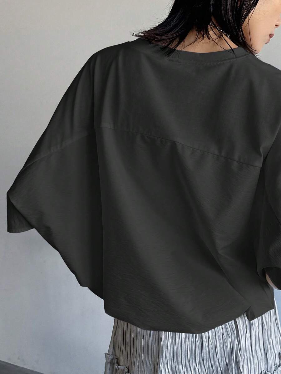 Áo cánh dơi rộng rãi màu trơn đơn giản cho nữ - màu đen - Xem 1