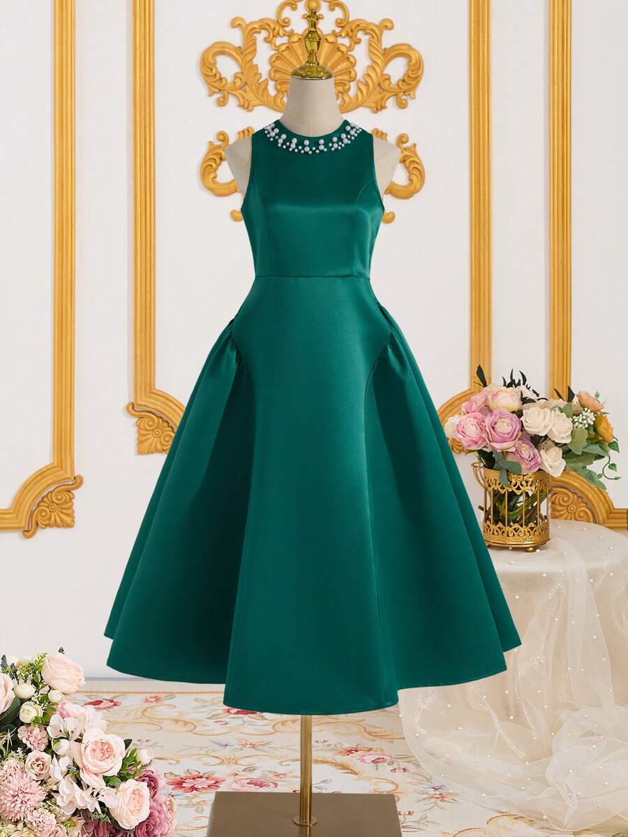 Váy không tay đính ngọc trai cổ satin cho bé gái tuổi teen - Màu xanh lá cây đậm - Xem 1