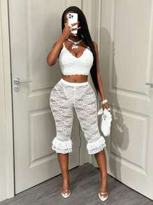 BamGleam Elegantes leggings de encaje transparente con volantes en el bajo, con un estilo sexy