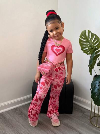 Conjunto de top de manga corta con cuello redondo y pantalones acampanados, estilo de moda casual callejera para niña joven