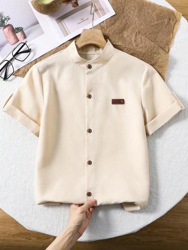 1 pieza Camisa casual de manga corta de color azul sólido con cuello de pie, estilo caballero, para niños preadolescentes, versátil para primavera/verano