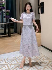 DAZY Ensemble 2 pièces pour femmes: blouse à col rond à motif floral et manches bouffantes, plus une jupe mini évasée