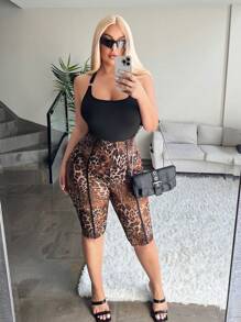 Radiana 大码女装春夏优雅性感豹纹透视七分裤，适合日常穿着、西式装扮、邮轮度假、音乐节、演唱会、狂欢派对、海滩度假、约会之夜、生日、单身派对、辣妹风、伊比沙岛风、纳什维尔风、锐舞派对、简约风、时尚风、夜店风、可爱风、休闲风、购物风、街头风、外出等各种场合。易于搭配，显瘦，凸显身材，修饰身形。豹纹印花 - 彩色 - 查看 9