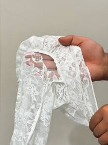 BamGleam Elegantes leggings de encaje transparente con volantes en el bajo, con un estilo sexy