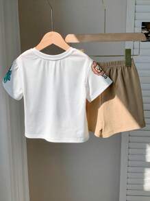 SHEIN Leap Crew 2 pièces/Set Débardeur maillots T et shorts pour bébés garçons/filles, style décontracté mignon avec imprimé animal au crayon, col rond, épaules tombantes, tricot ample. 2 pièces, tenue appropriée pour le printemps et l'été, pour porter à l'intérieur et à l'extérieur - Kaki - Voir 2