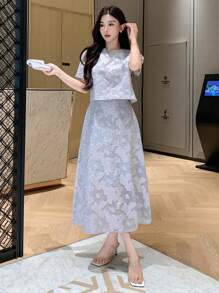 DAZY Ensemble 2 pièces pour femmes: blouse à col rond à motif floral et manches bouffantes, plus une jupe mini évasée