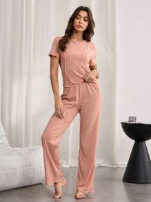 Conjunto de pijama casual de punto acanalado para mujer con cuello redondo y manga corta, y pantalones