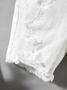 SHEIN Pantalones cortos de niño con diseño desgarrado de color liso