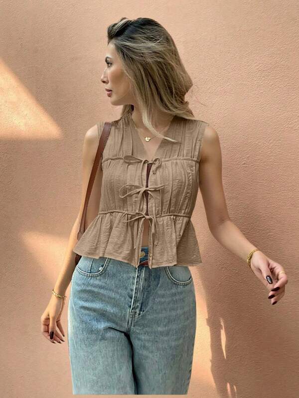 SHEIN Frenchy Camisa sin mangas con nudo al frente y unicolor casual de vacaciones para mujer