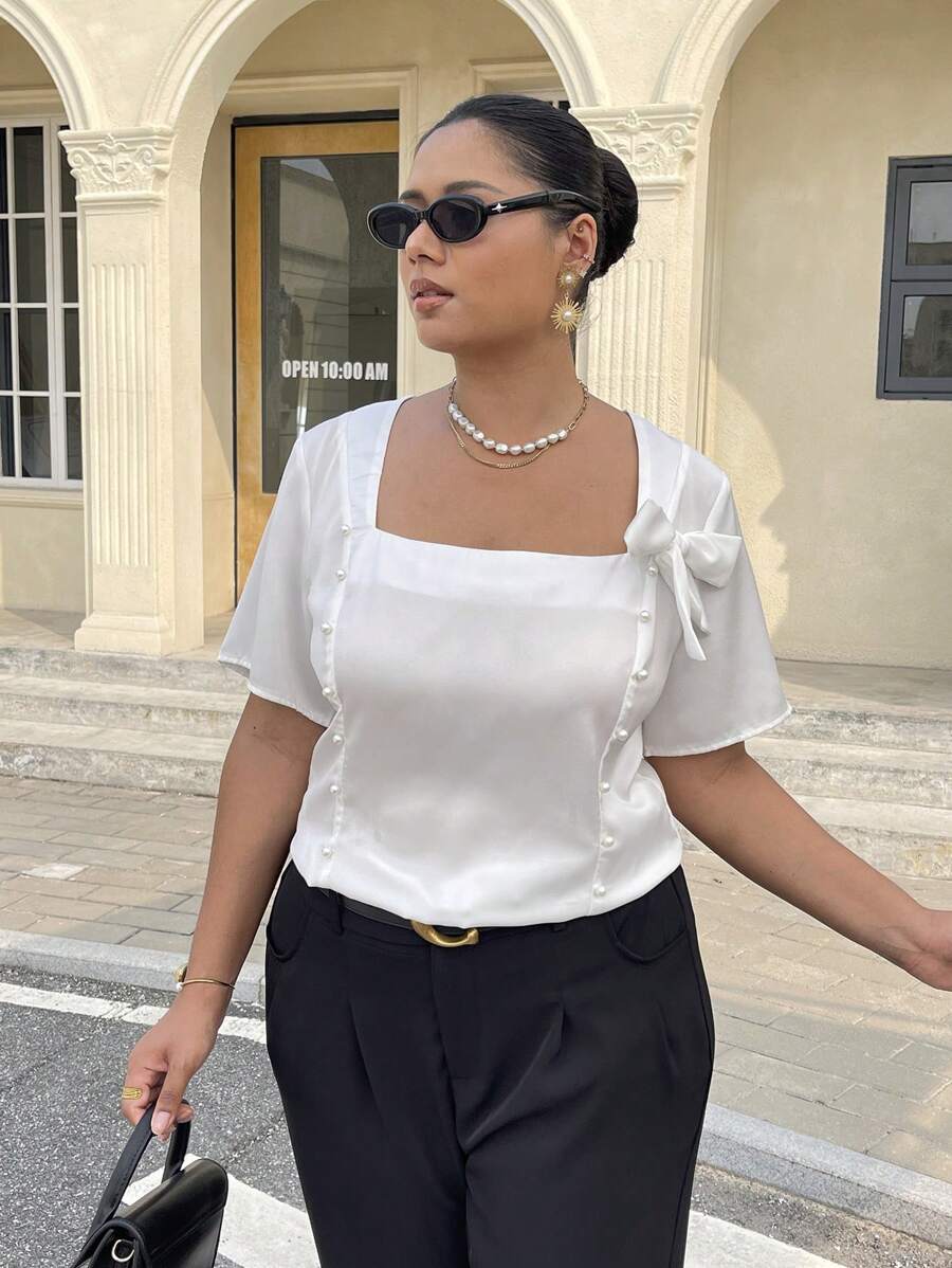 Flirla Blusa in stile romantico francese da donna taglie forti con arricciature e decorazione a fiocco - Bianco - Visualizzare 1