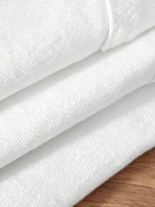 SHEIN Pantalones cortos de niño con diseño desgarrado de color liso