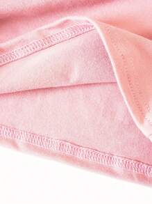 T-shirt à col rond pour femmes avec imprimé de nœud pailleté